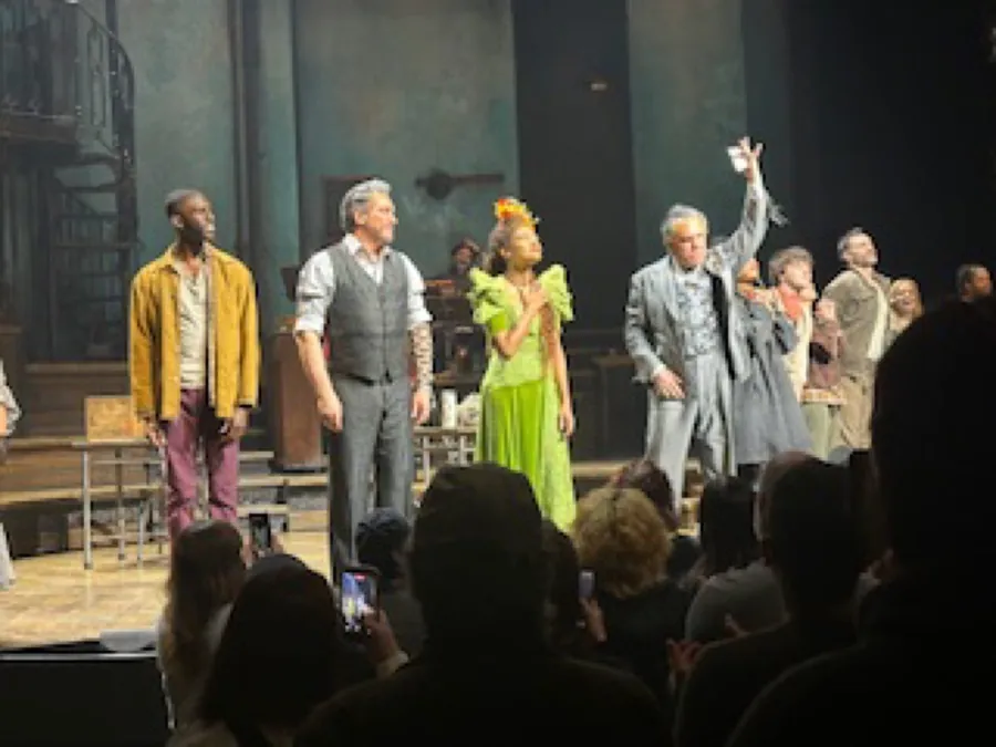 The Hadestown cast taking a curtain call on Broadway